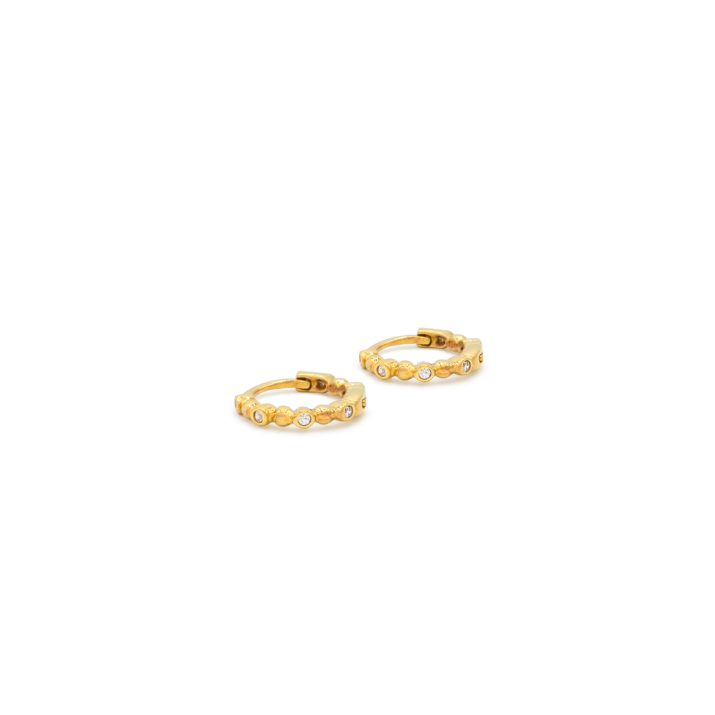 A pair of gold-plated Capri hoop earrings with zircon stones.